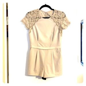 BCBGMaxAzria backless cream romper with lace